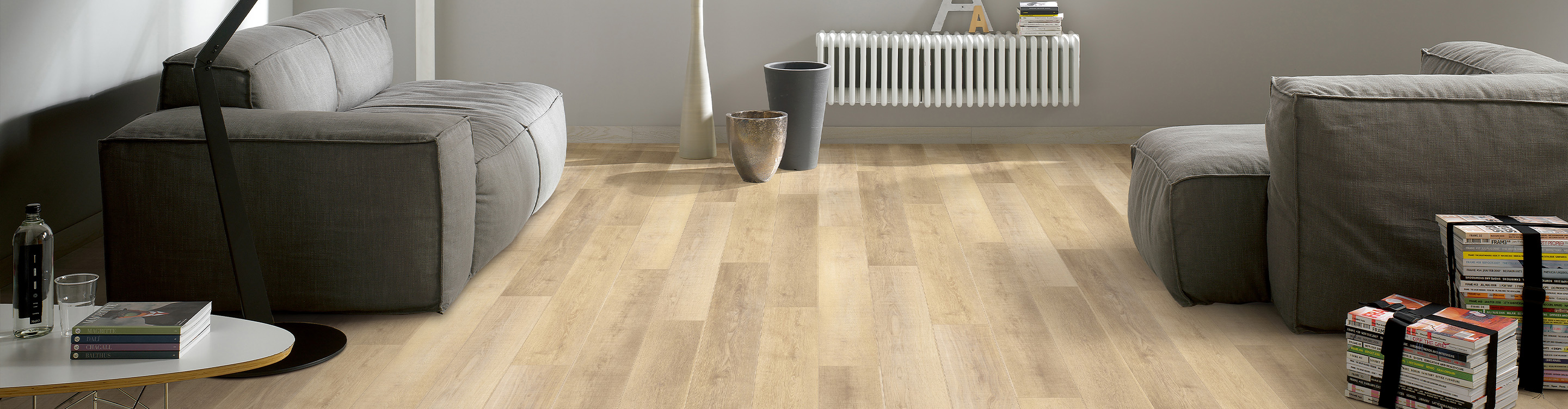 living room laminate floor light with grey couch